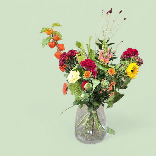 Herfst plukboeket “Zonnige Herfstpluk” – geel, oranje & rood met zonnebloem